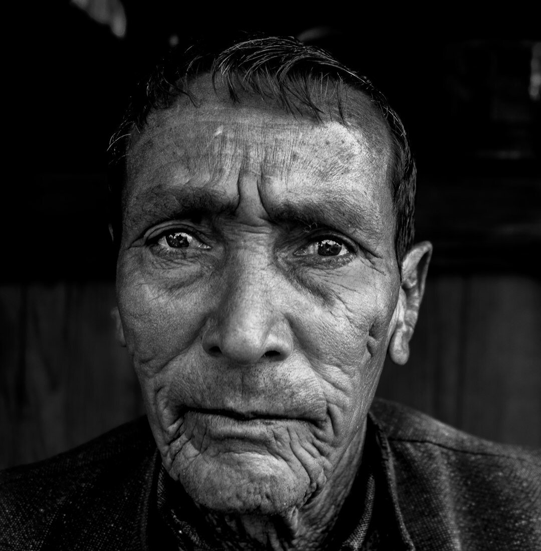 Portrait of a Mapuche artisan woman weaving textiles in southern Chile