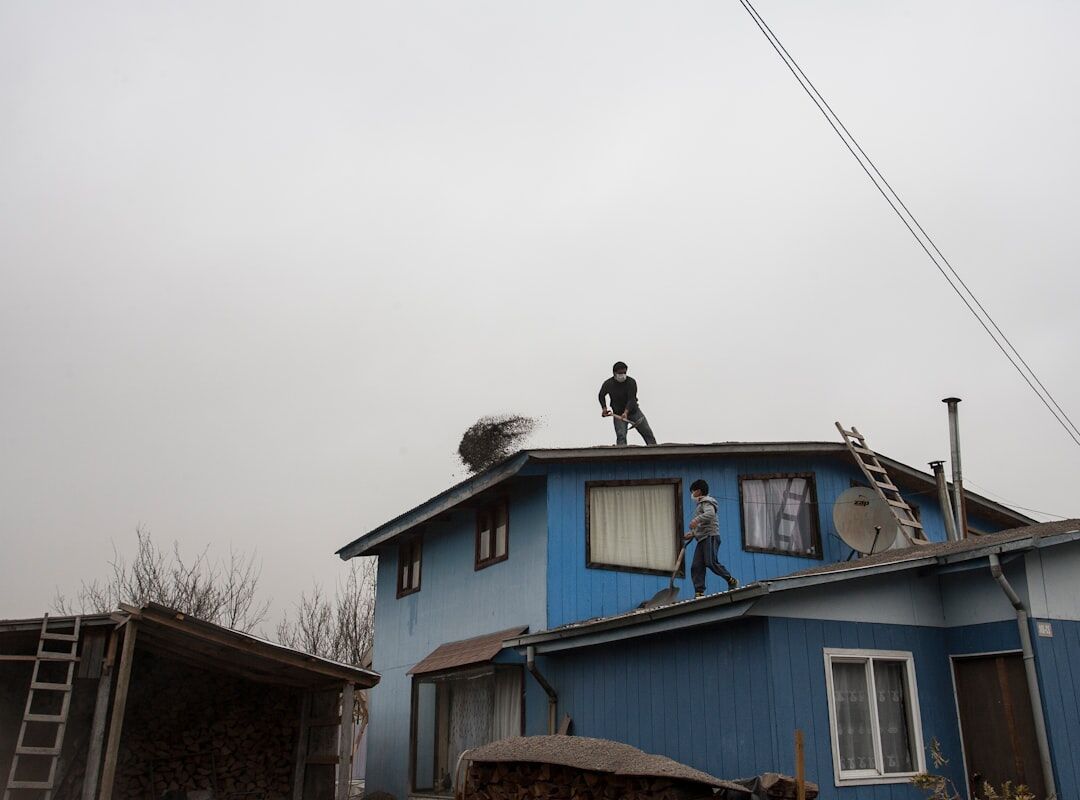Black and white documentary photograph of daily life in a Chilean neighborhood